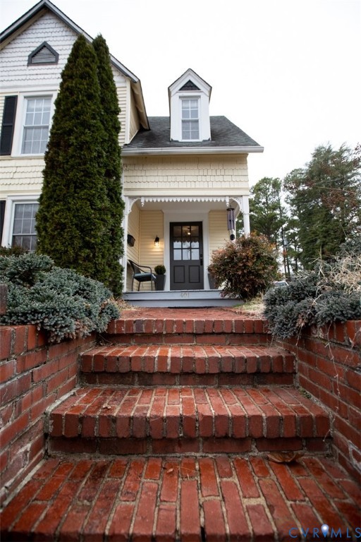 401 2nd Avenue Farmville, VA 23901 - Photo 2 of 55 a view of balcony with two chairs and a potted plant