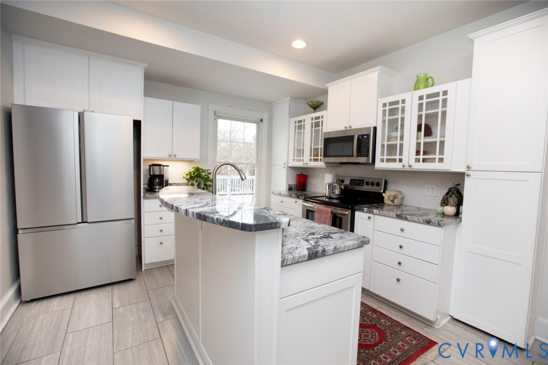 401 2nd Avenue Farmville, VA 23901 - Photo 24 of 55 a kitchen with a refrigerator stove and microwave