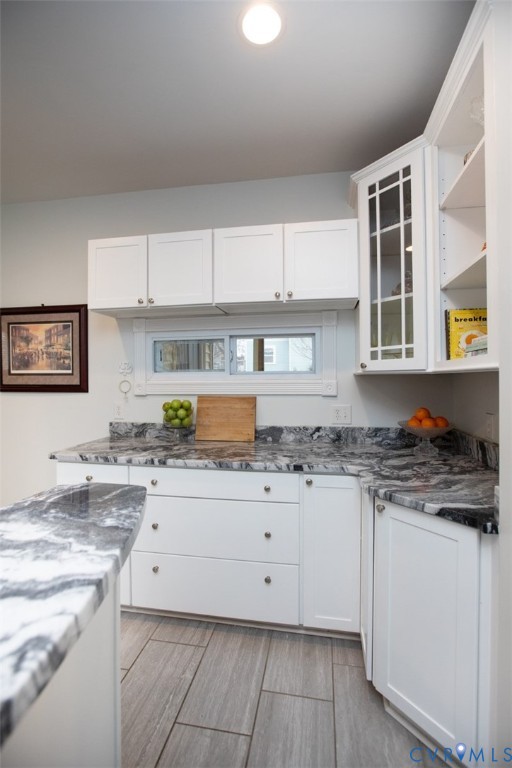 401 2nd Avenue Farmville, VA 23901 - Photo 27 of 55 a kitchen with granite countertop a sink and cabinets