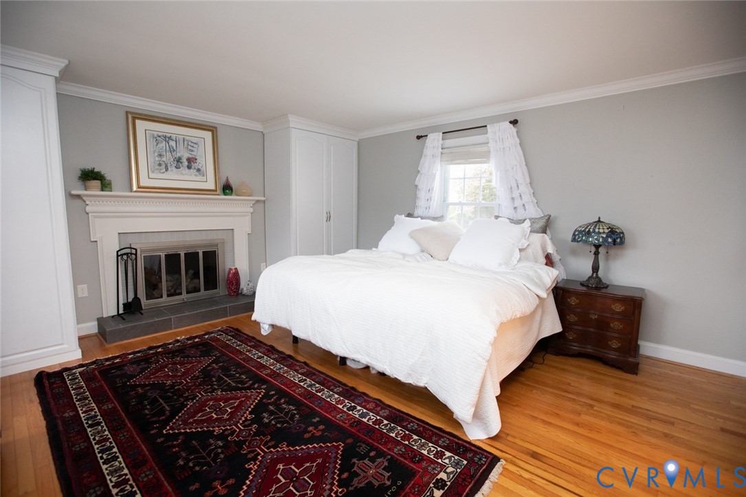 401 2nd Avenue Farmville, VA 23901 - Photo 31 of 55 a bedroom with a bed and a fireplace