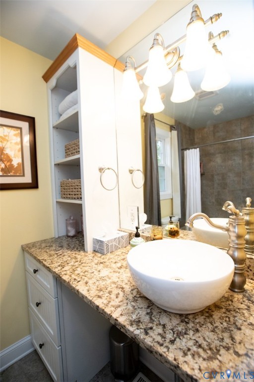 401 2nd Avenue Farmville, VA 23901 - Photo 40 of 55 a view of a kitchen with granite countertop a sink and a wooden floor