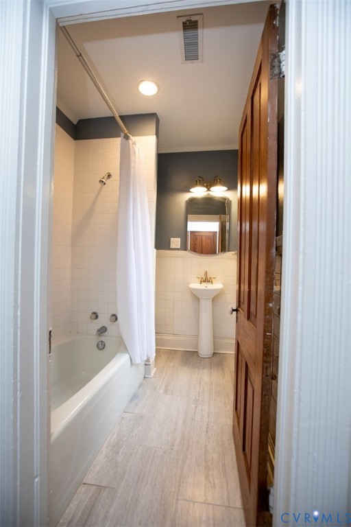 401 2nd Avenue Farmville, VA 23901 - Photo 50 of 55 a bathroom with a sink a toilet and shower