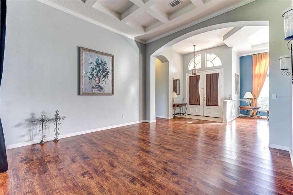 918 Algare Loop Windermere, FL 34786 - Photo 30 of 73 a view of a hallway with wooden floor and a bathroom