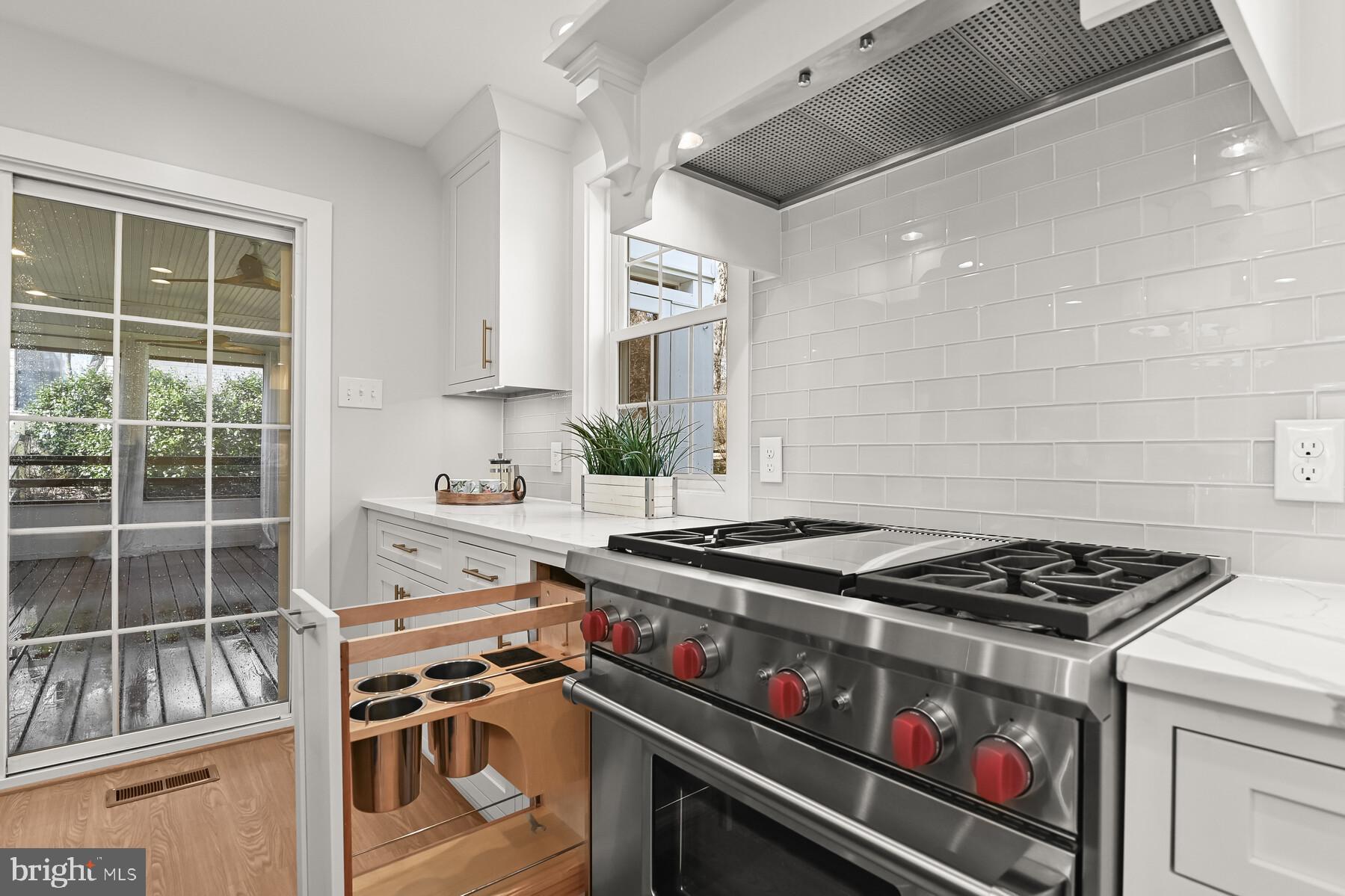 5029 Ten Mills Road Columbia, MD 21044 - Photo 11 of 49 'Tool Box' next to range stores knives & utensils