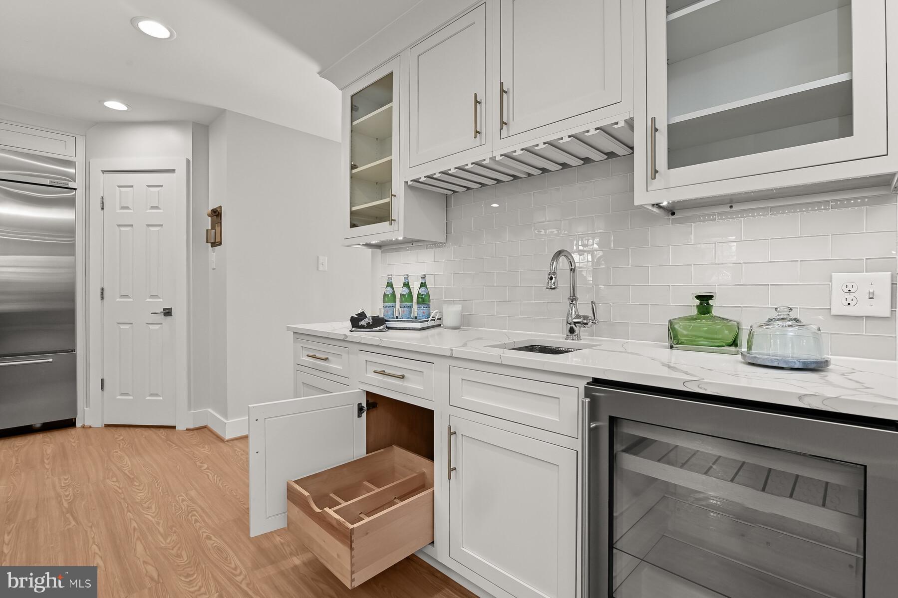 5029 Ten Mills Road Columbia, MD 21044 - Photo 14 of 49 Service area with roll out beverage cabinet