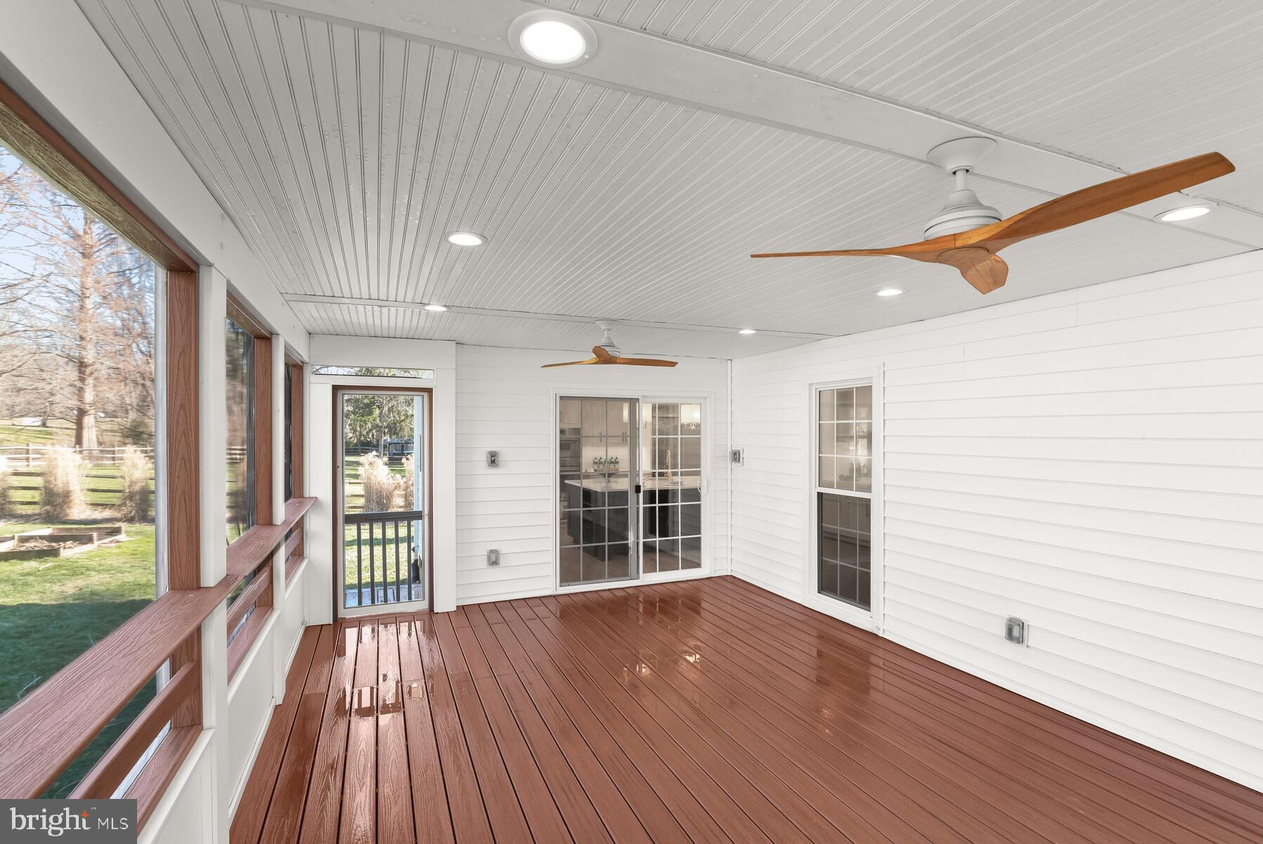 5029 Ten Mills Road Columbia, MD 21044 - Photo 18 of 49 Screened porch w/trex decking & recessed lighting
