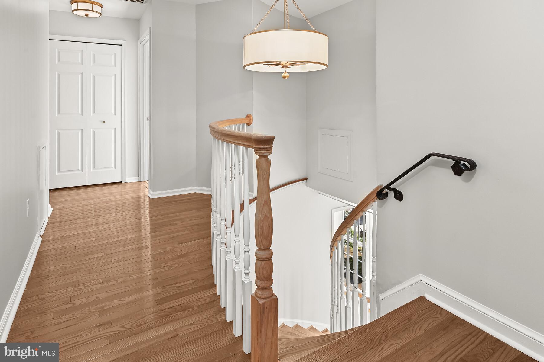 5029 Ten Mills Road Columbia, MD 21044 - Photo 22 of 49 Upstairs landing with hardwood flooring