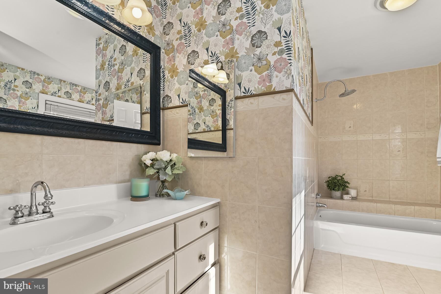 5029 Ten Mills Road Columbia, MD 21044 - Photo 25 of 49 Primary bath with ceramic tile