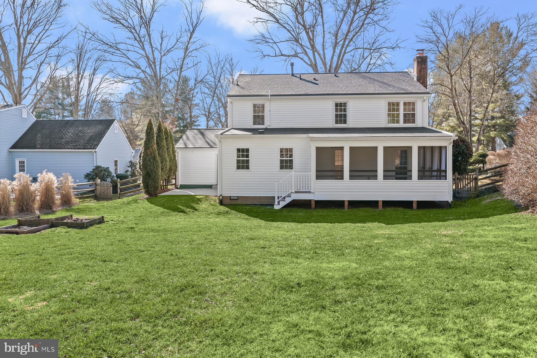 5029 Ten Mills Road Columbia, MD 21044 - Photo 38 of 49 Rear view of home & lawn