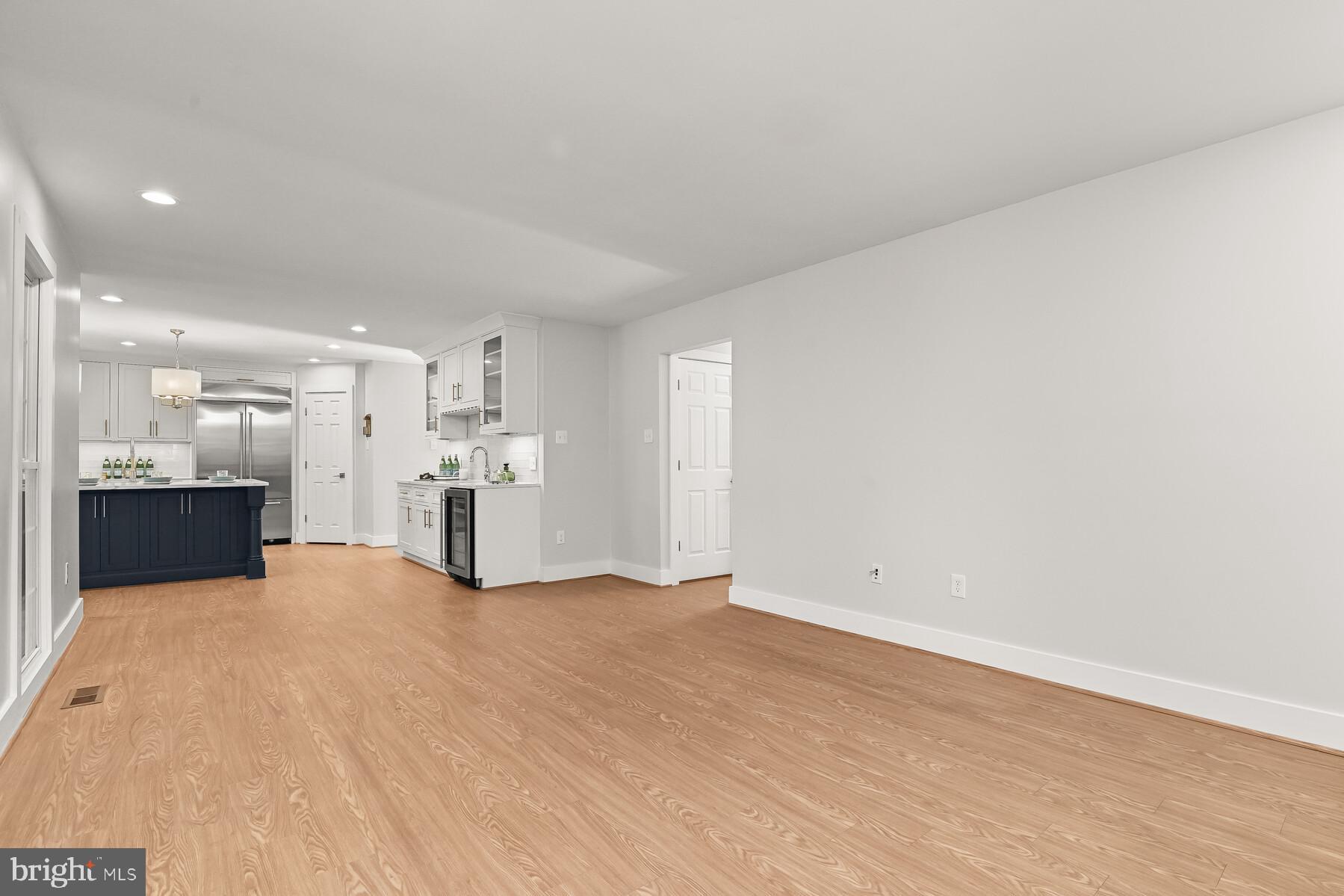 5029 Ten Mills Road Columbia, MD 21044 - Photo 47 of 49 Family room is open to kitchen