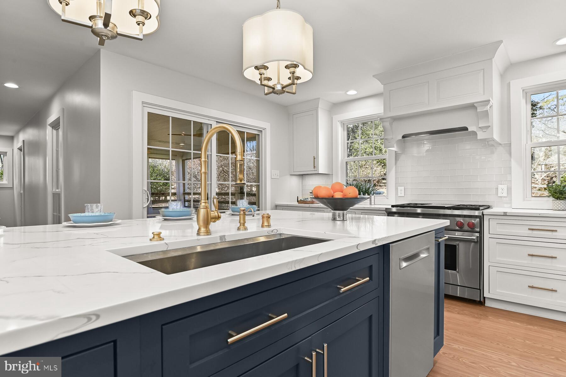 5029 Ten Mills Road Columbia, MD 21044 - Photo 9 of 49 Island w/pendant lighting & large farmhouse sink