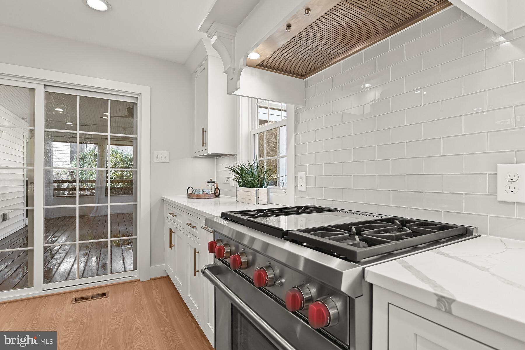 5029 Ten Mills Road Columbia, MD 21044 - Photo 10 of 49 Wolf range with covered ventilation