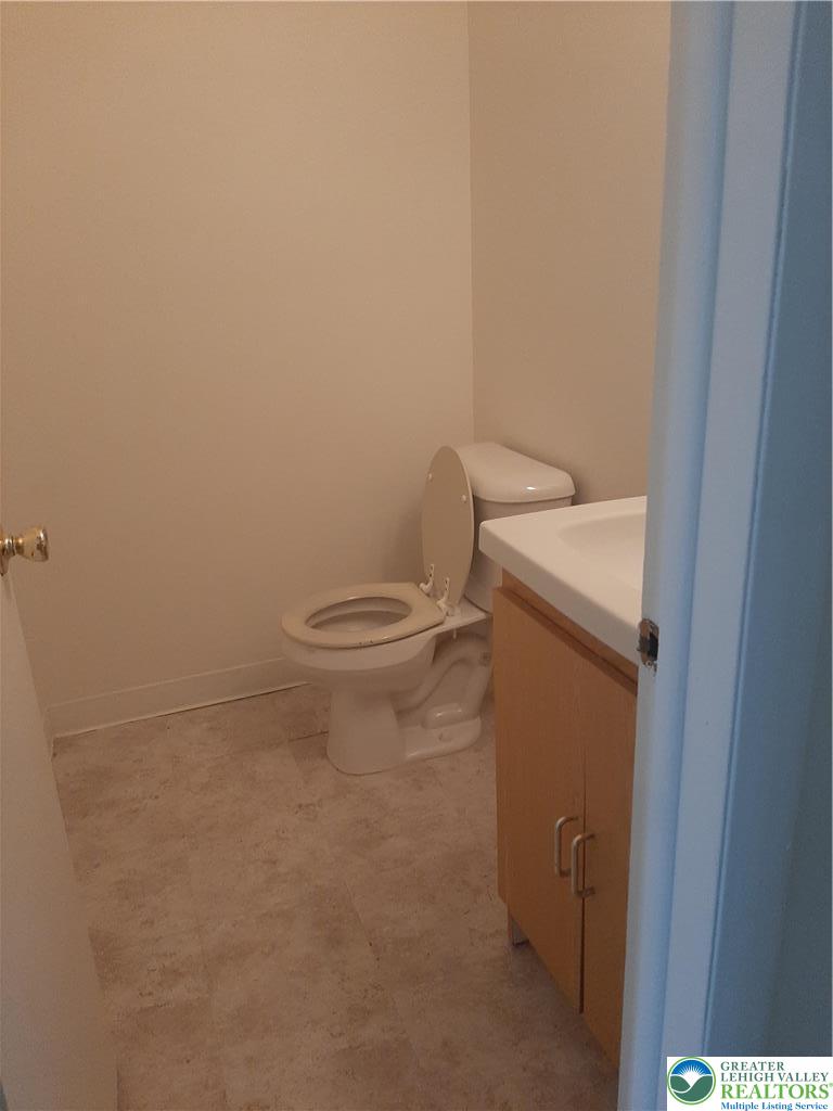 824 East 8th Street Bethlehem, PA 18015 - Photo 4 of 10 a bathroom with a toilet and a sink