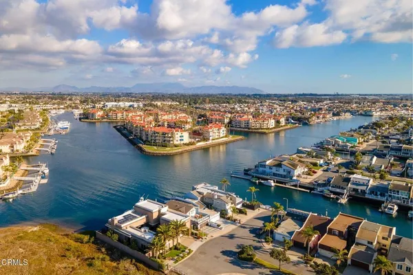 an aerial view of a house with lake view