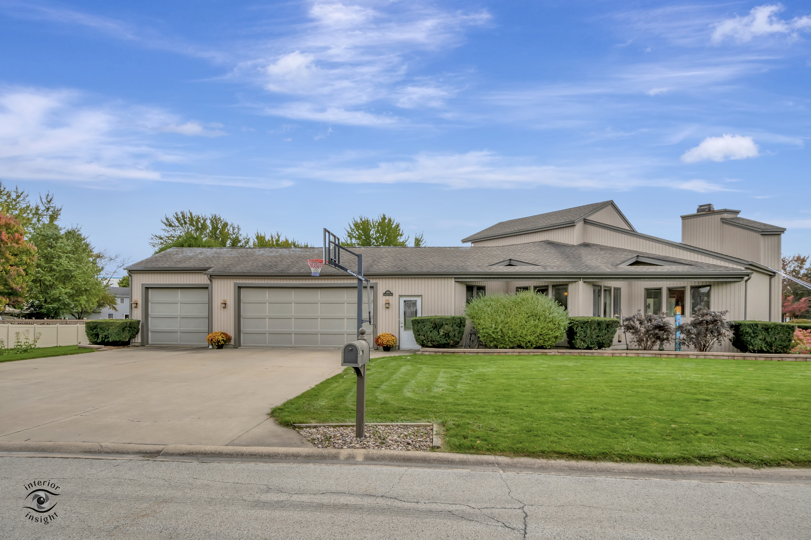 1560 Southhampton Drive Bourbonnais, IL 60914 - Photo 2 of 28 a front view of a house with a yard and garage