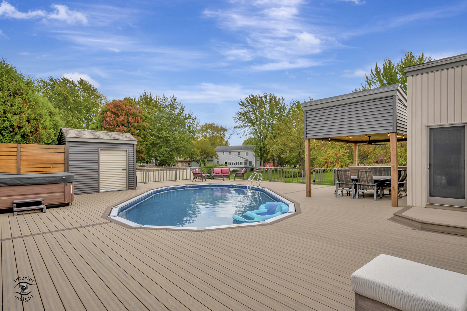 1560 Southhampton Drive Bourbonnais, IL 60914 - Photo 24 of 28 a view of backyard with swimming pool and seating space