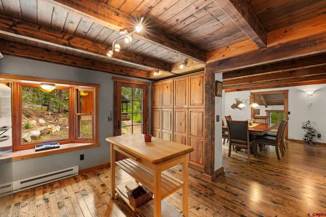 a view of a dining room with furniture