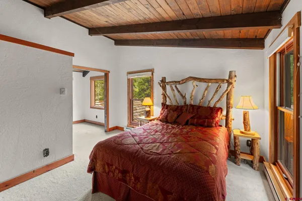 a bathroom with a sink a mirror and a bathtub