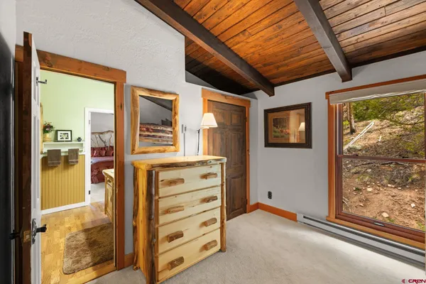 a balcony with furniture and window