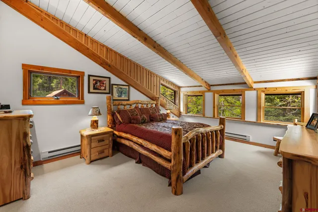 a spacious bathroom with a sink a large mirror and a bathtub