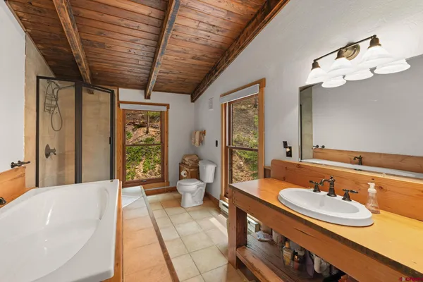 a view of a backyard of the house