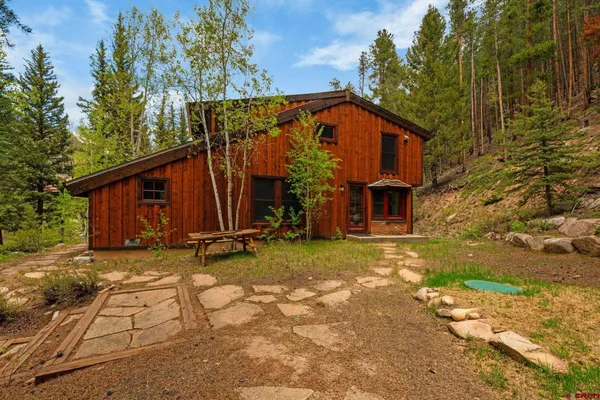 a view of yard with swimming pool