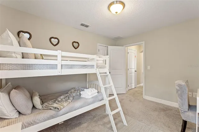 a bathroom with a sink a toilet and tub