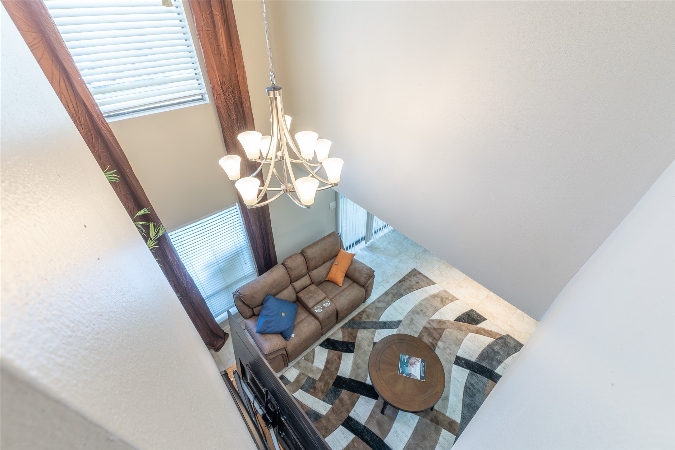38 Regency Point Montgomery, TX 77356 - Photo 11 of 49 living room and chandelier from above