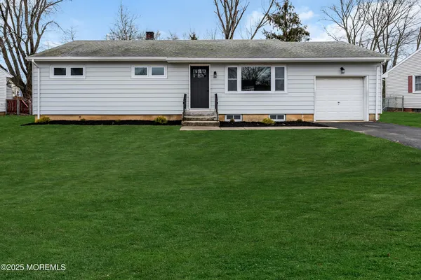 a front view of house with yard