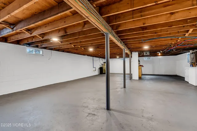 a view of a room with wooden walls