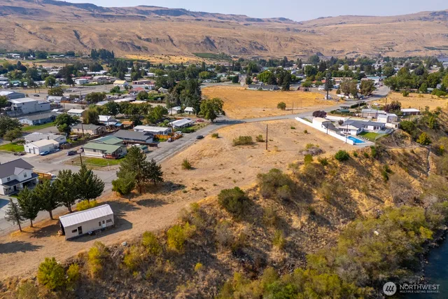 a view of a city with mountains in the background