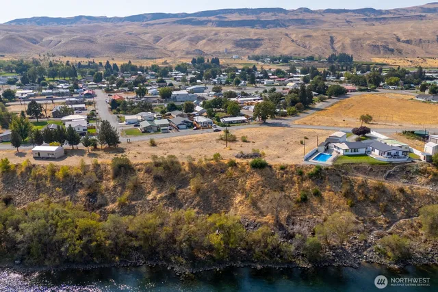 a view of a city with mountains in the background