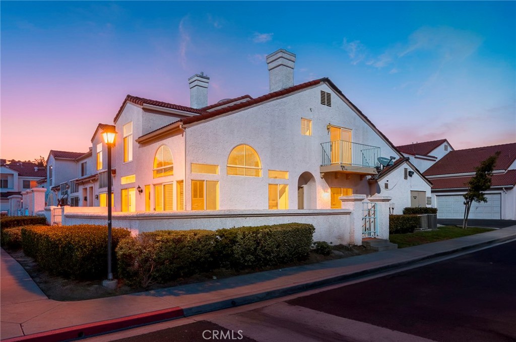 a view of house with yard