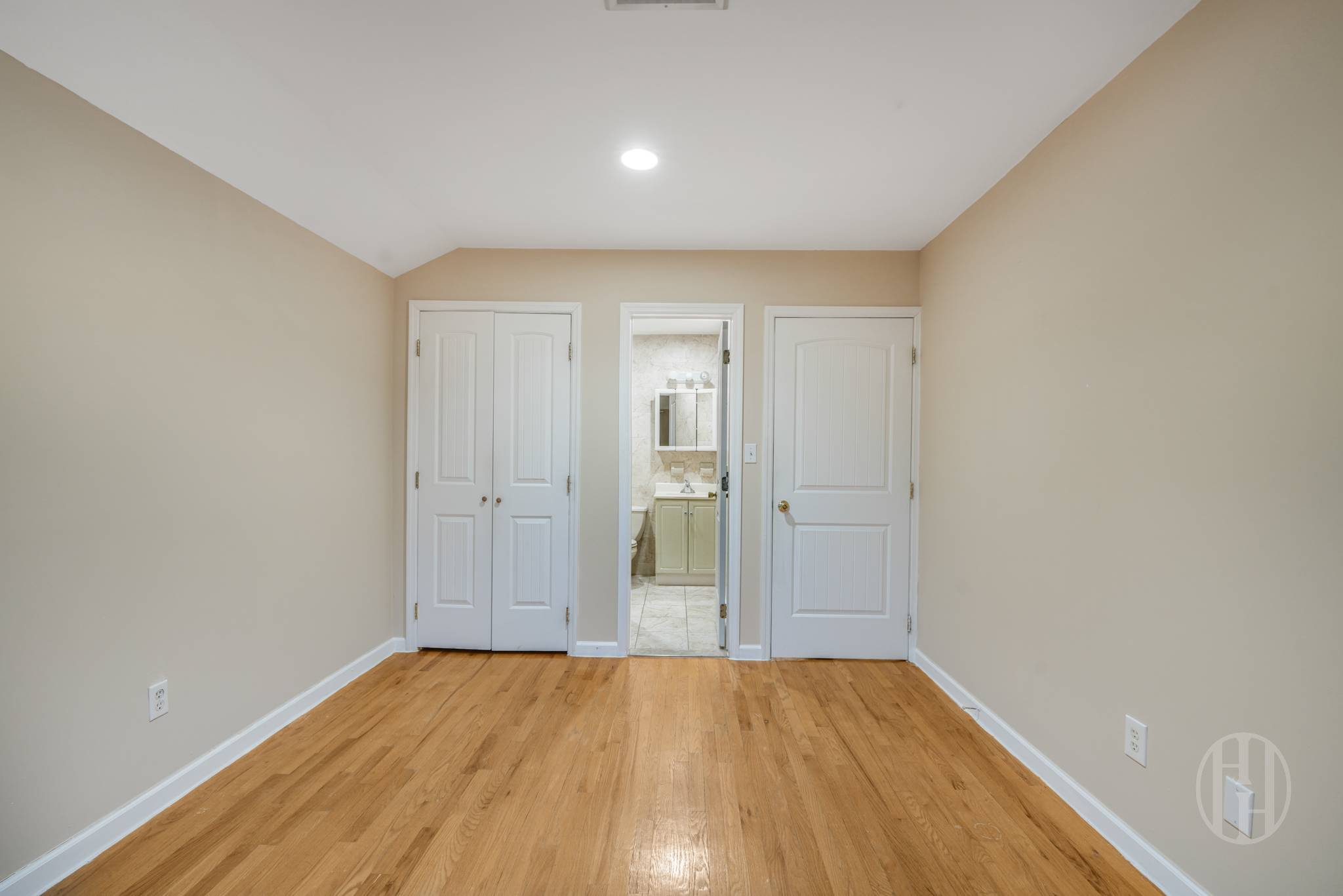 88-10 70th Road, Unit 2 Queens, NY 11375 - Photo 13 of 17 wooden floor in an empty room