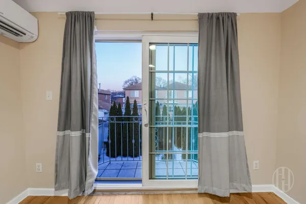 a view of a balcony with a door