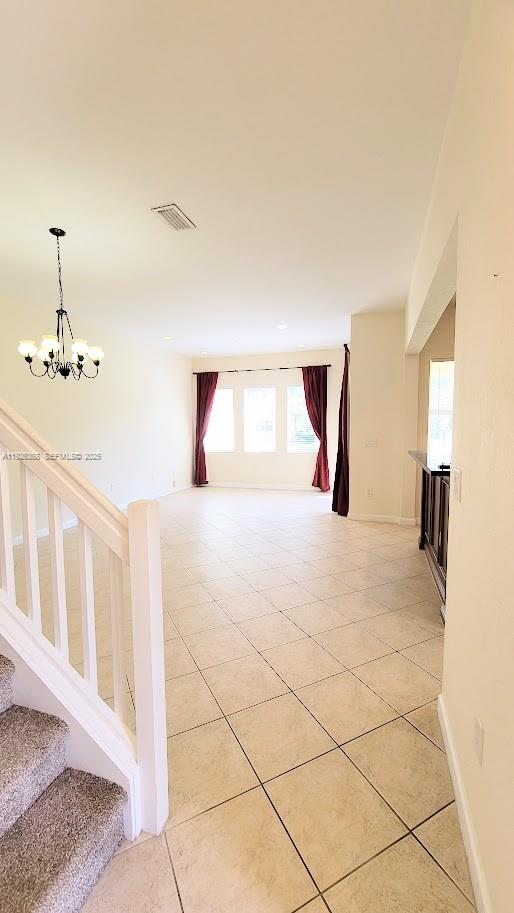 6033 Northwest 118th Drive, Unit 6033 Coral Springs, FL 33076 - Photo 15 of 43 a bedroom with a large bed and a window