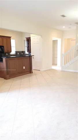 a view of a kitchen with a sink