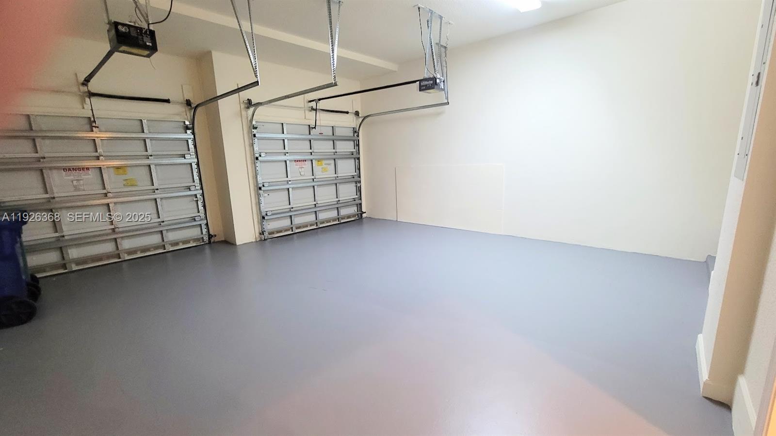 6033 Northwest 118th Drive, Unit 6033 Coral Springs, FL 33076 - Photo 40 of 43 a view of a room with racks on the wall