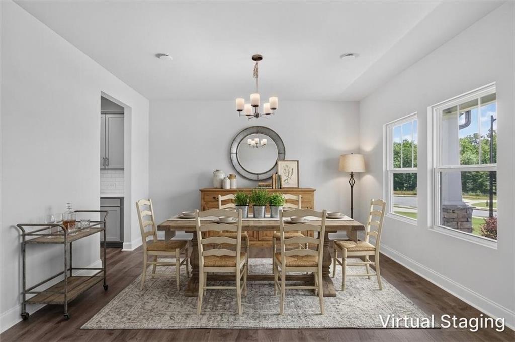 107 Ledgemont Way Acworth, GA 30101 - Photo 4 of 57 a view of a dining room with furniture window and wooden floor