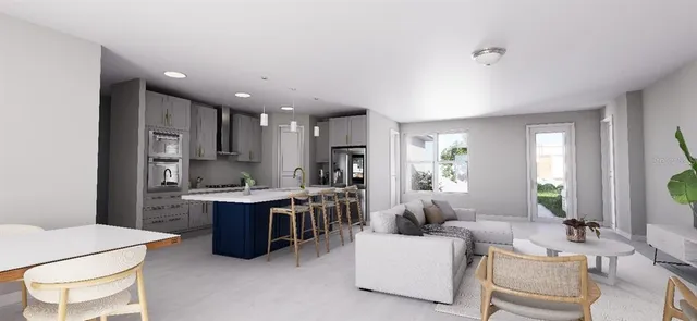 a view of kitchen with kitchen island wooden cabinets and stainless steel appliances
