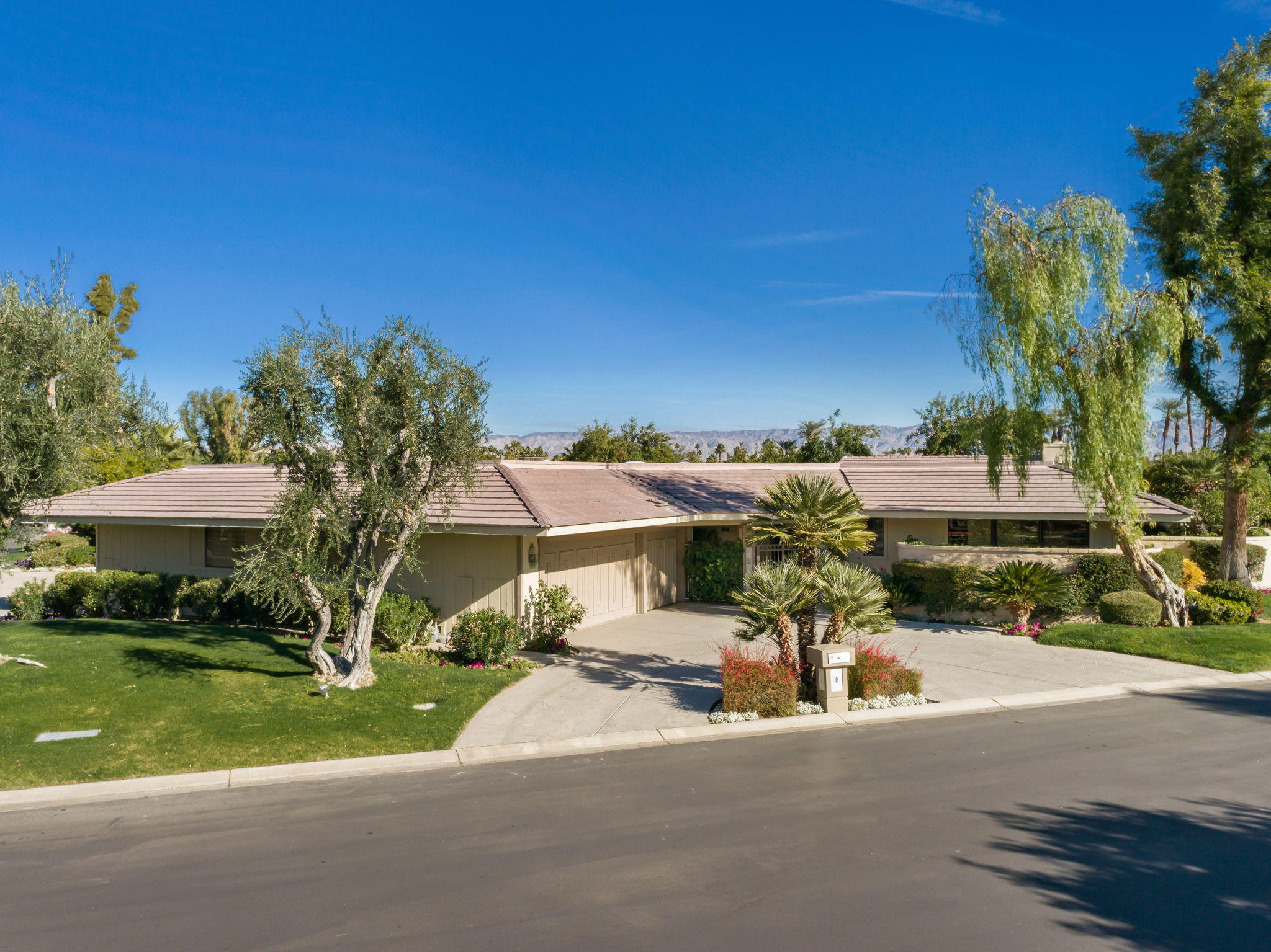 1 Hamlet Court Rancho Mirage, CA 92270 - Photo 2 of 41 a view of a town with barn house