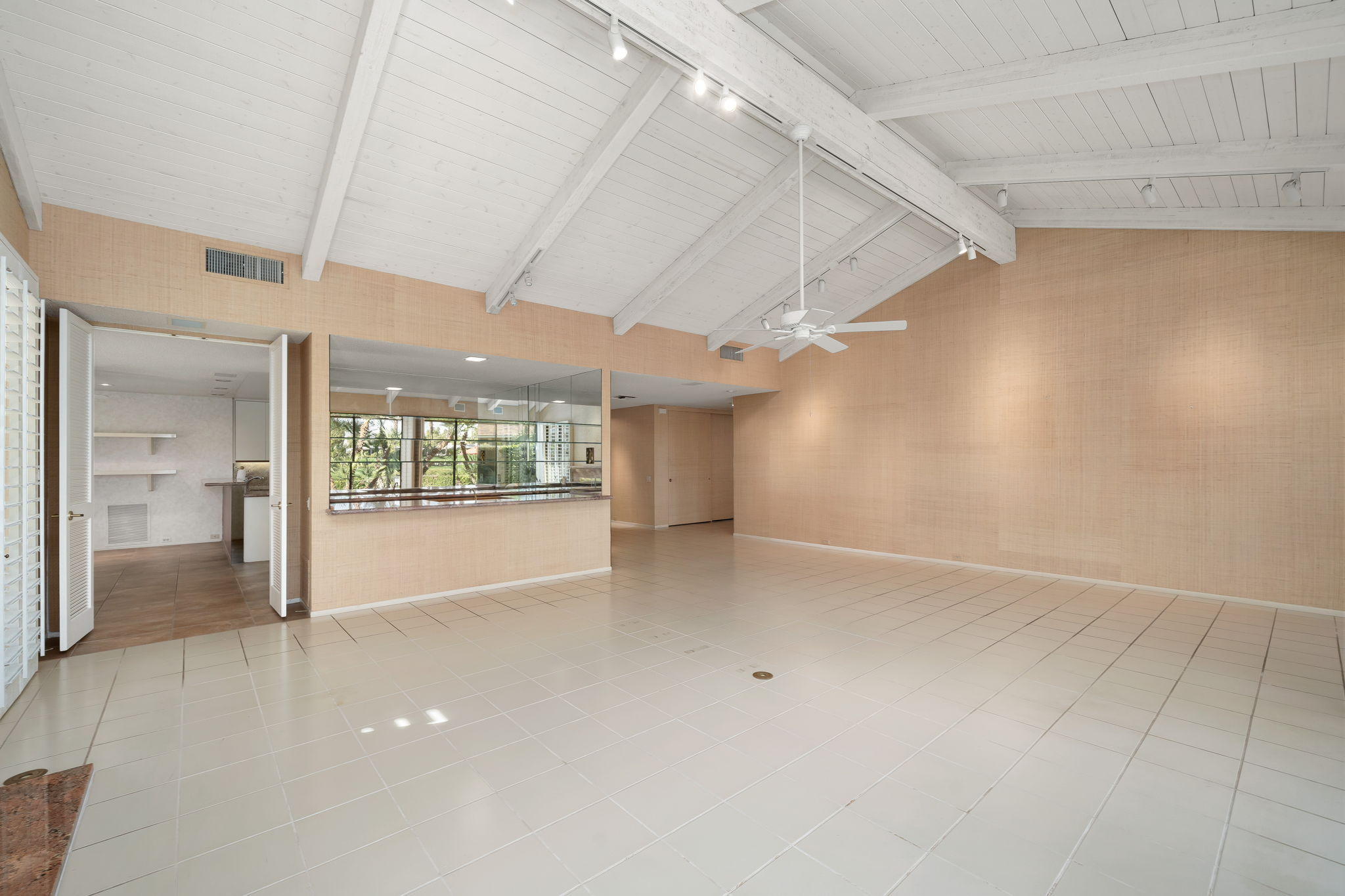1 Hamlet Court Rancho Mirage, CA 92270 - Photo 11 of 41 an empty room with windows and entrance