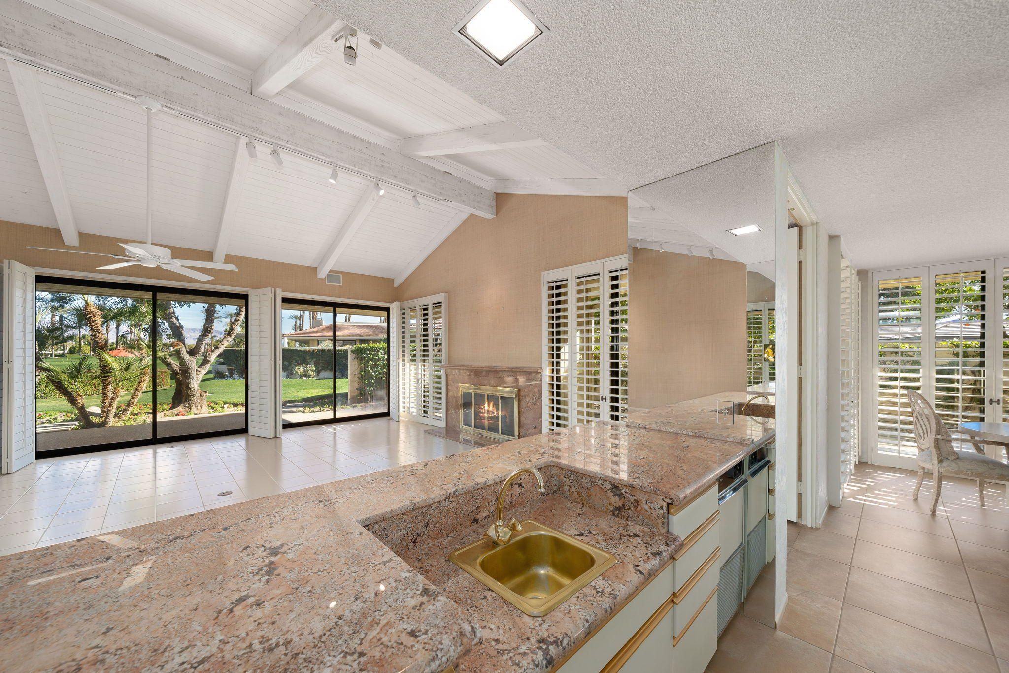 1 Hamlet Court Rancho Mirage, CA 92270 - Photo 18 of 41 a living room with furniture and large windows