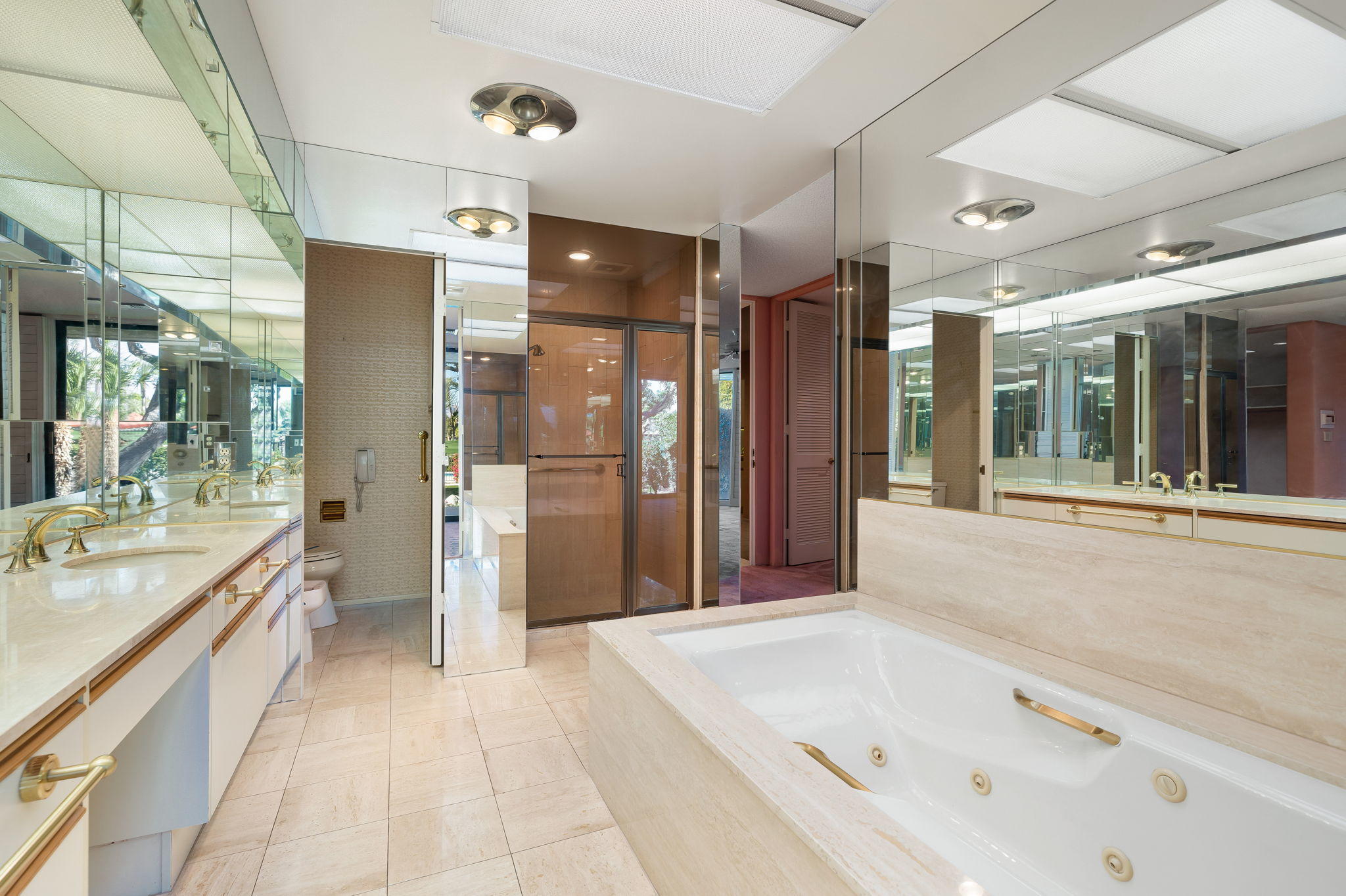 1 Hamlet Court Rancho Mirage, CA 92270 - Photo 33 of 41 a large spacious bathroom with a tub shower and sink