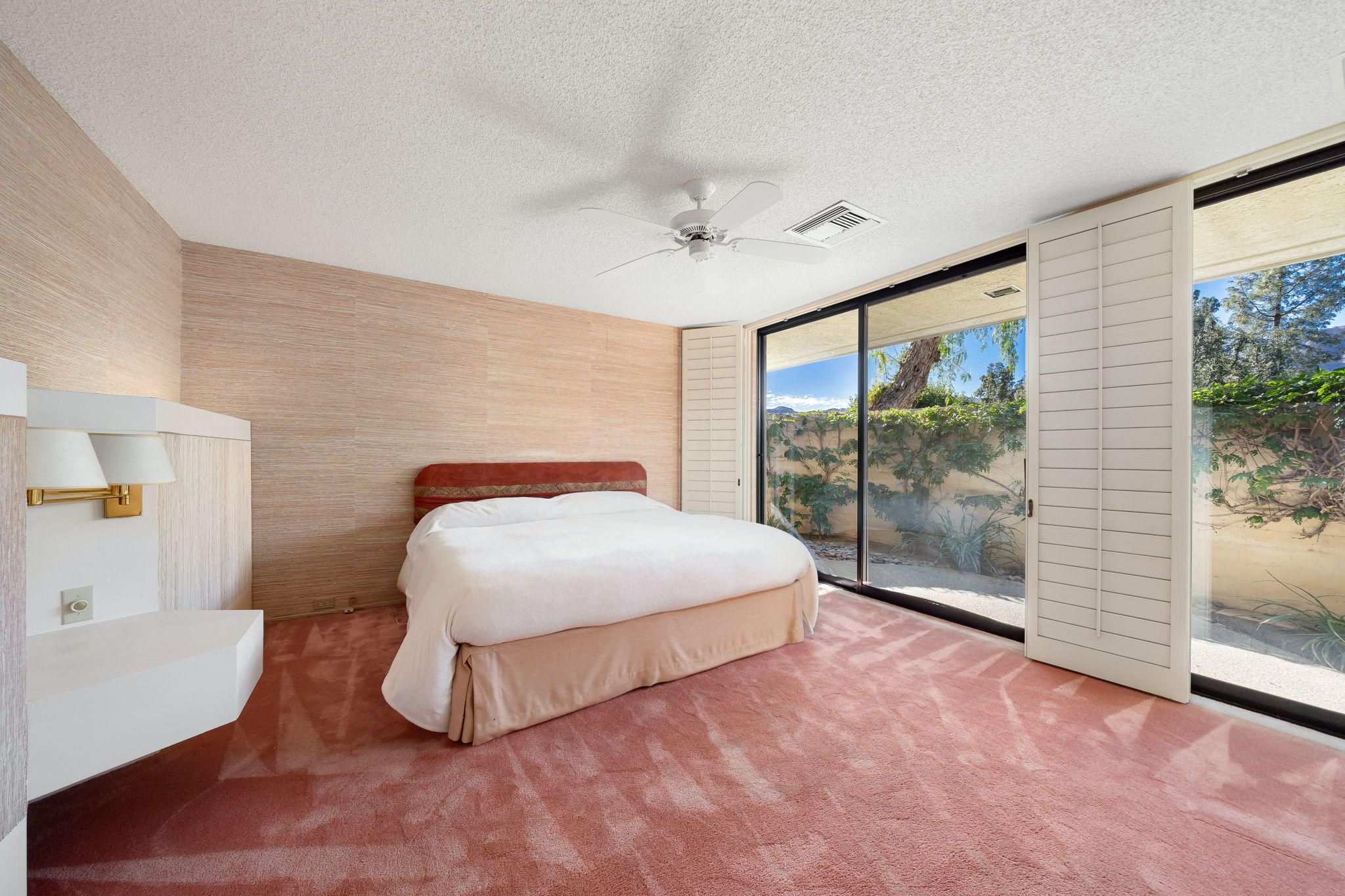 1 Hamlet Court Rancho Mirage, CA 92270 - Photo 39 of 41 a spacious bedroom with a large bed and a large window