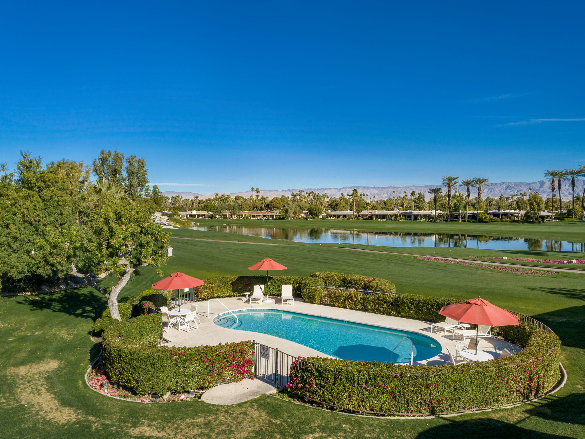 1 Hamlet Court Rancho Mirage, CA 92270 - Photo 5 of 41 a view of a swimming pool and outdoor space