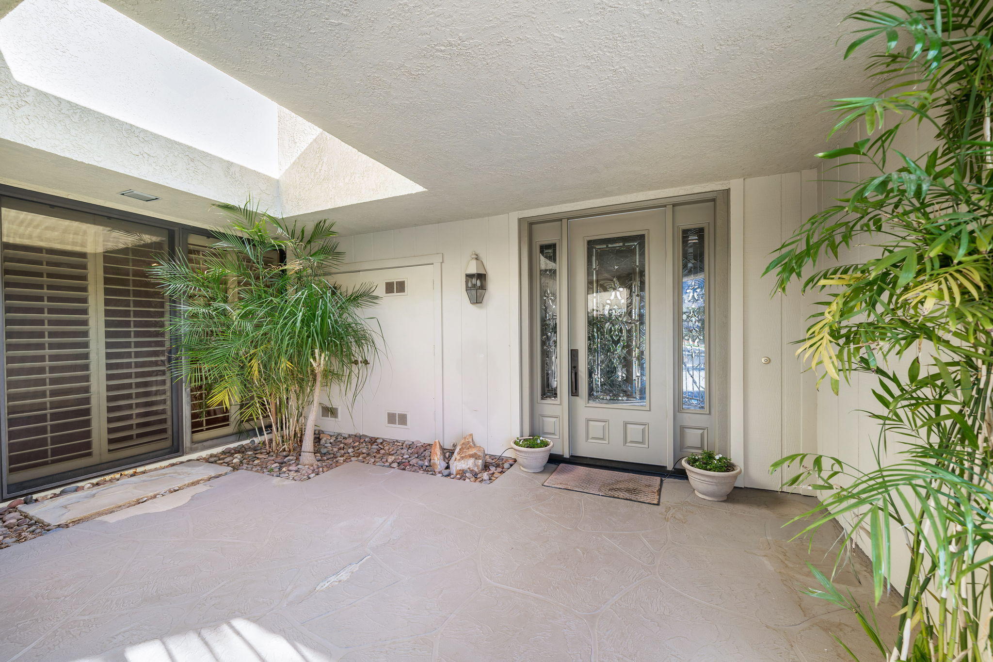 1 Hamlet Court Rancho Mirage, CA 92270 - Photo 7 of 41 a view of a house with a street