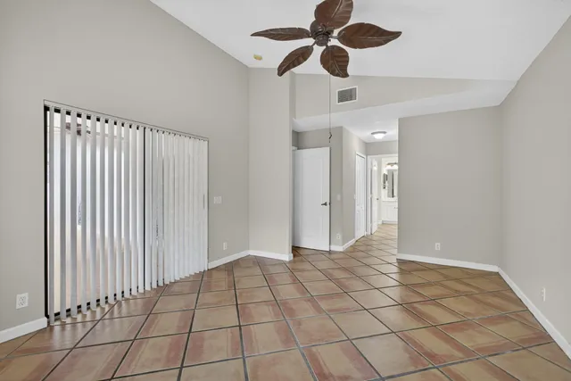 a utility room with closet dryer and washer
