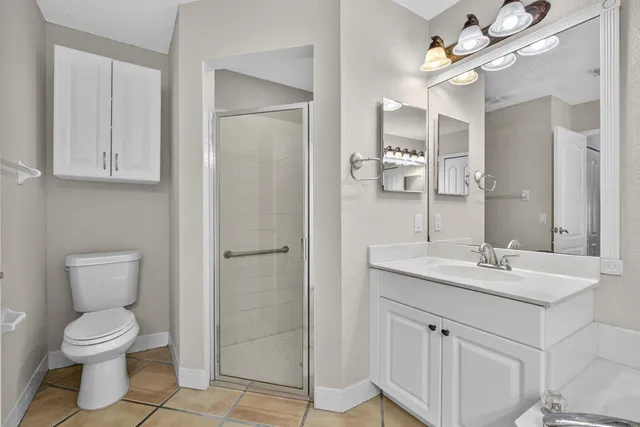 a bathroom with a sink a toilet and a bathtub