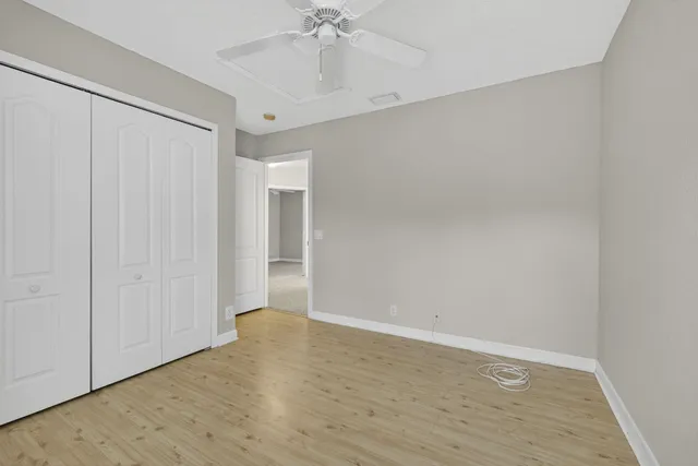 a view of a chair and table in the garden